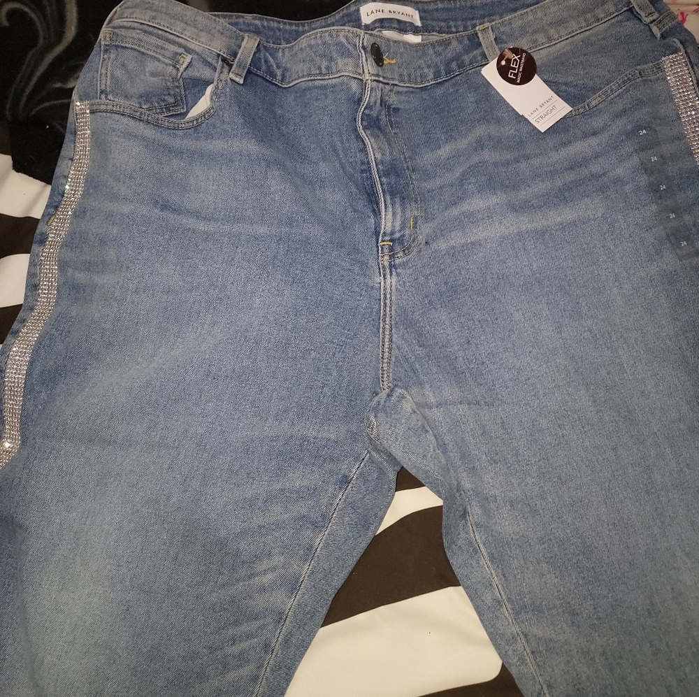 Jeans with rhinestone embellishments running down each side